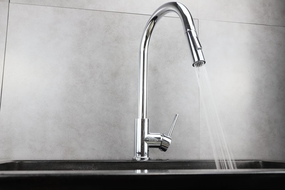 Contemporary Chrome Pull Out Kitchen Faucet: Dual Spray for Enhanced Versatility and Style.